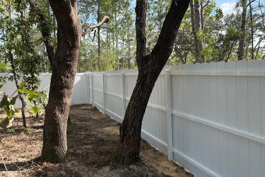 White PVC privacy fence at a residential property