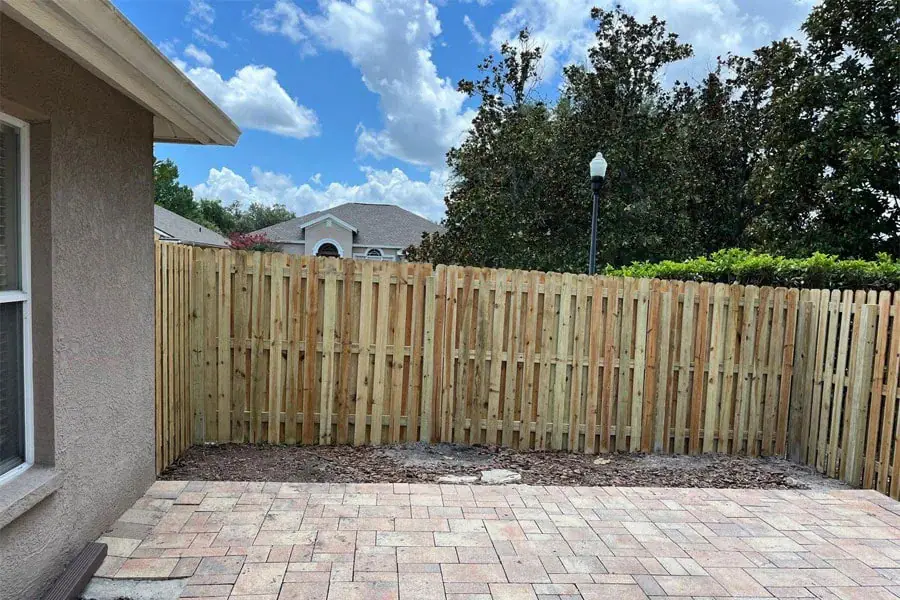Completed wood privacy fence at a residential property