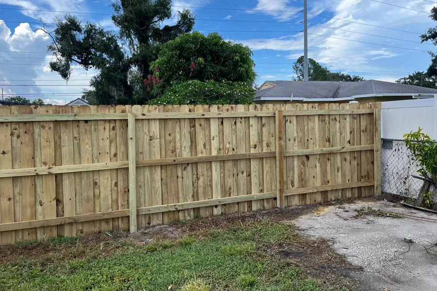 Natural wood privacy fence at a residential property